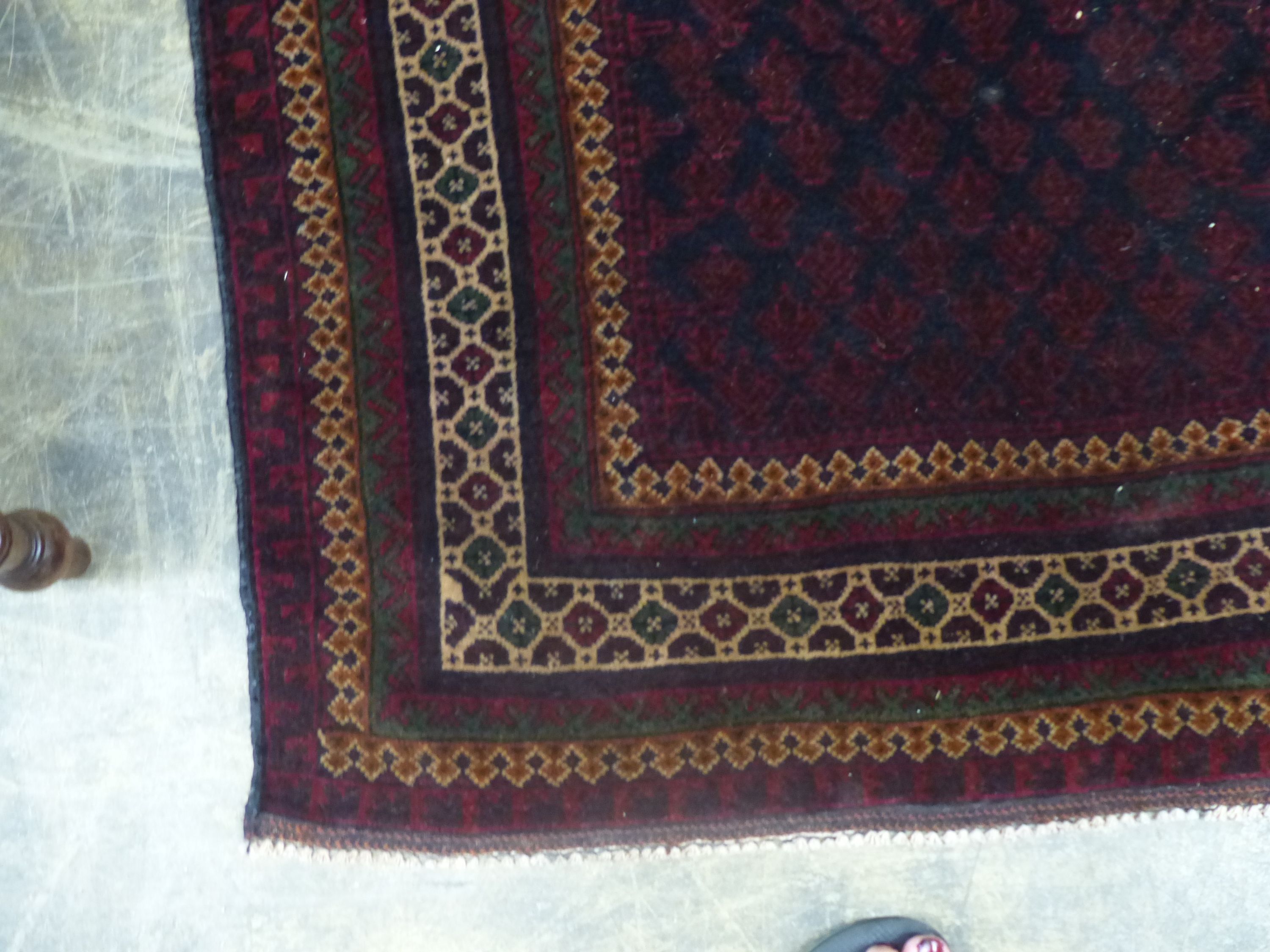 A Belouch red ground prayer rug, 146 x 90cm